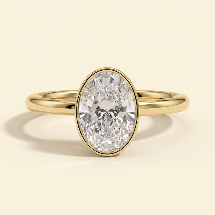 The Uriela - Oval Cut Lab Grown Diamond Bezel Set Solitaire Engagement Ring