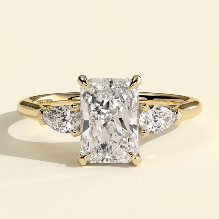 The Mirabel - Radiant Cut Lab Grown Diamond Three Stone Engagement Ring with Pear Side Stones