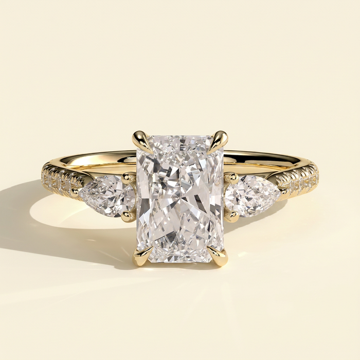 The Riviera - Radiant Cut Lab Grown Diamond Trilogy Ring with Pear Side Stones and Pave Band