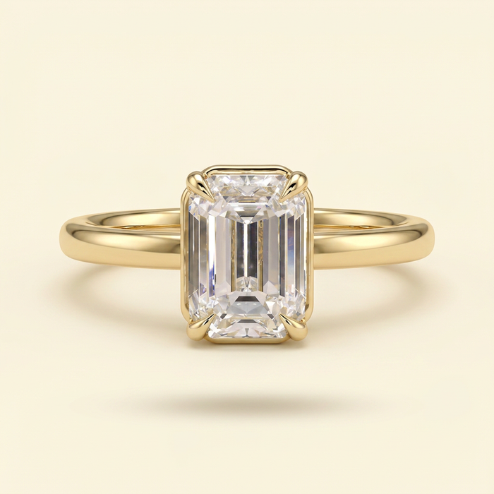 The Coralie - Emerald Cut Lab Grown Diamond Low Set Solitaire with Bezel Frame Engagement Ring