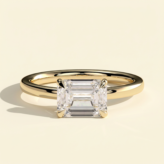 The Quila - Emerald Cut Lab Grown Diamond East West Solitaire Engagement Ring with Raised Basket