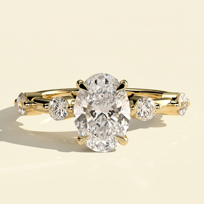 The Nuria - Oval Lab Grown Diamond Ring with Round Accents & Hidden Halo