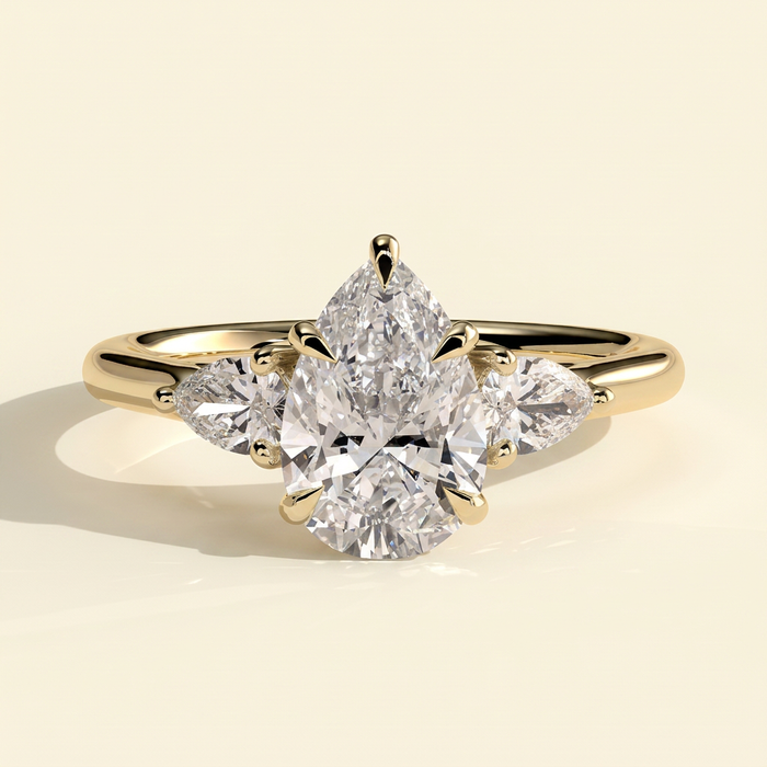 The Viorela - Pear Cut Lab Grown Diamond Three Stone Engagement Ring with Pear Side Stones and Floating Cathedral Setting