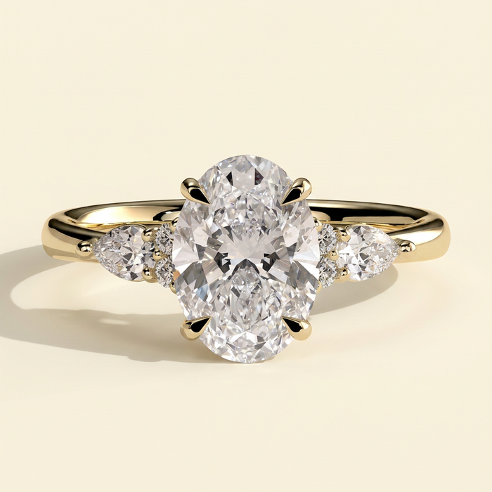 The Rialta - Oval Cut Lab Grown Diamond Three Stone Engagement Ring with Pear and Round Side Stones