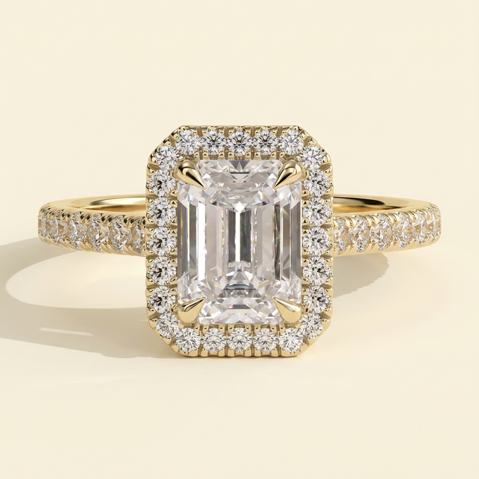 The Delara - Emerald Cut Lab Grown Diamond Four Claw Halo Engagement Ring with Pave Band