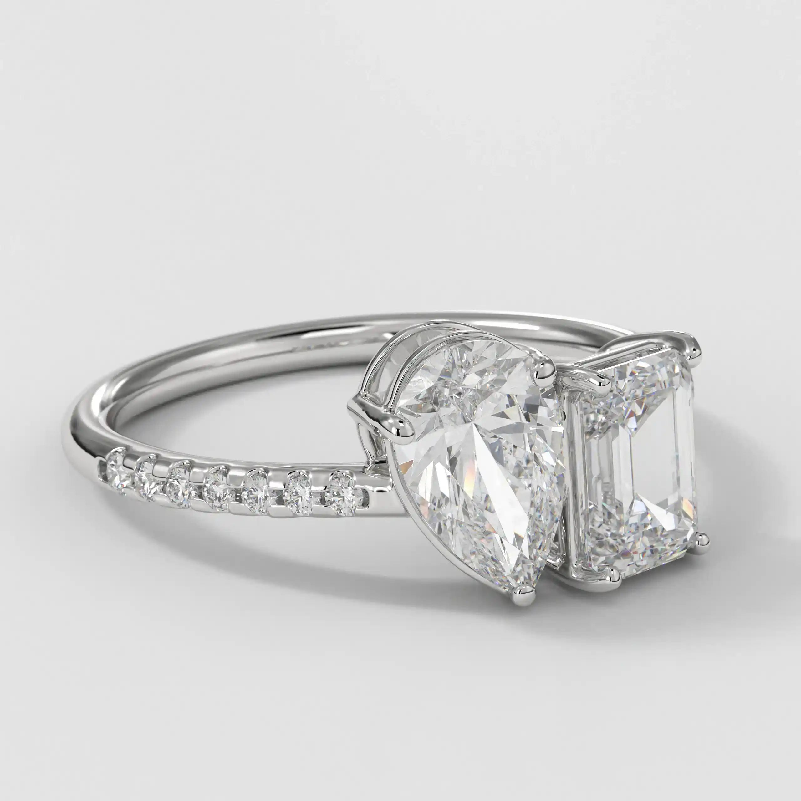 The Toi Et Moi Pear Emerald Pave