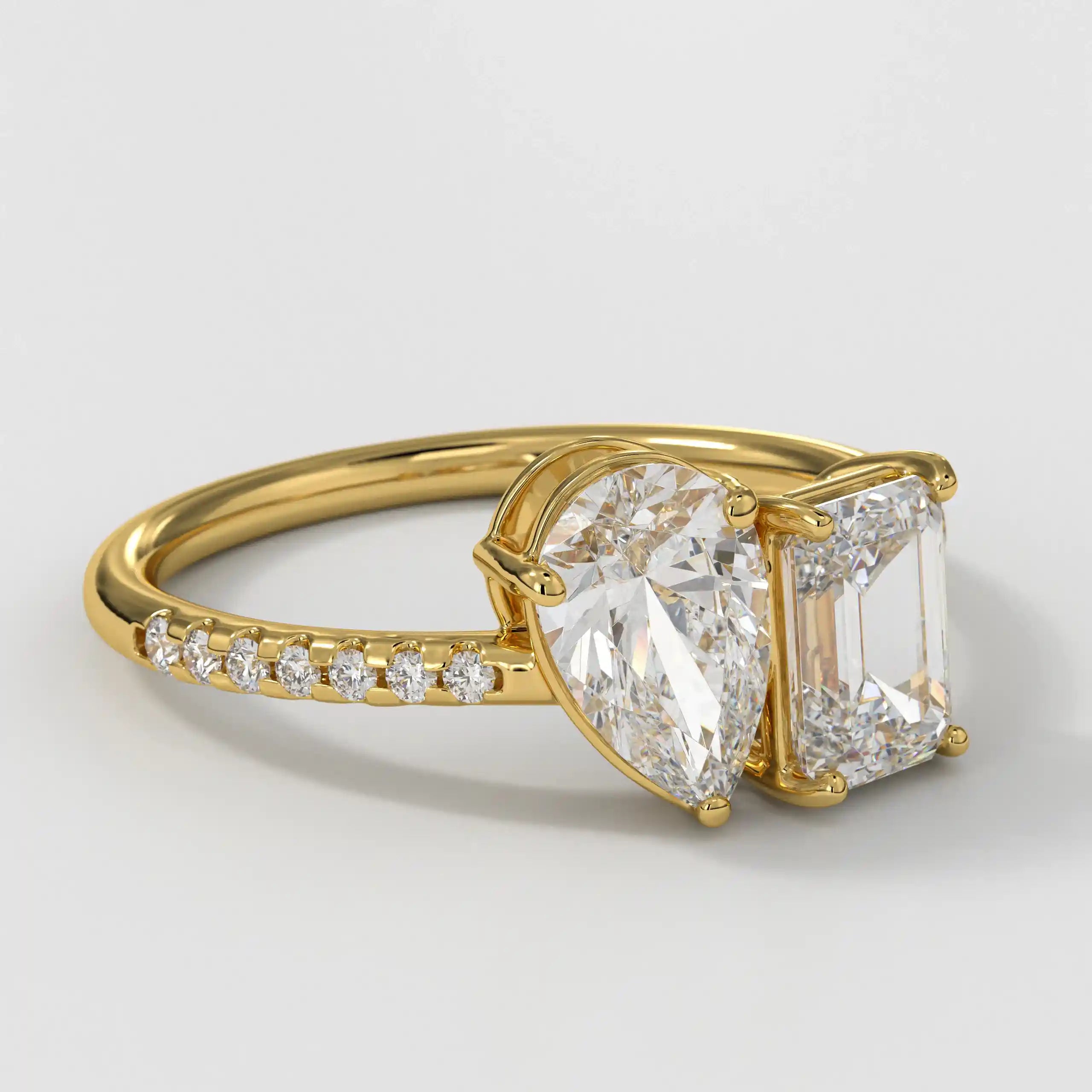 The Toi Et Moi Pear Emerald Pave