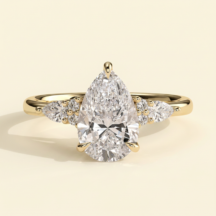 The Ilona - Pear Cut Lab Grown Diamond Three Claw Tulip Gallery Solitaire with Pear and Round Shoulder Stones Engagement Ring