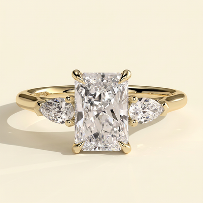 The Mirabel - Radiant Cut Lab Grown Diamond Three Stone Engagement Ring with Pear Side Stones