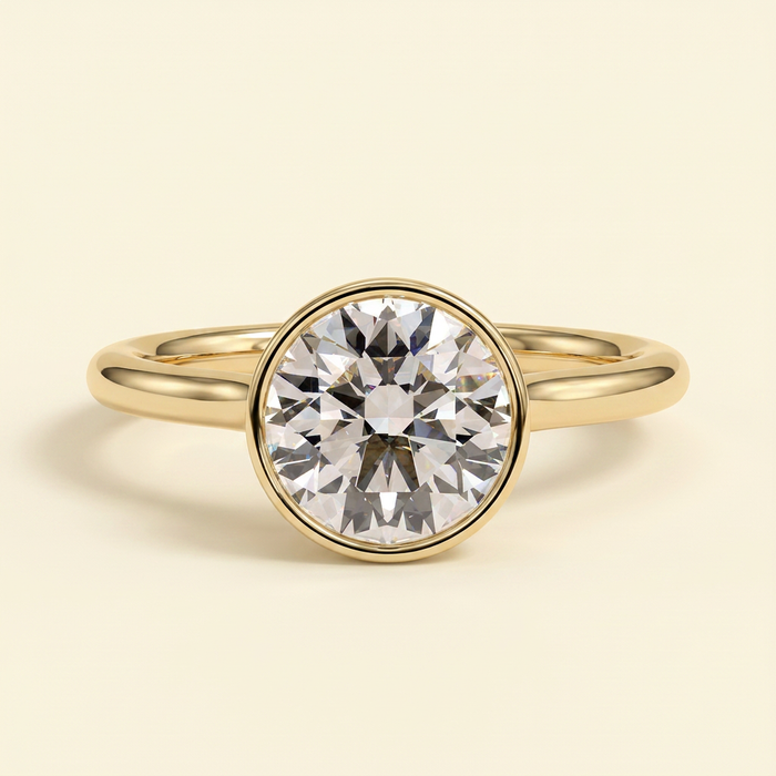 The Ysela - Round Cut Lab Grown Diamond Bezel Set Solitaire with Twisted Gallery Engagement Ring