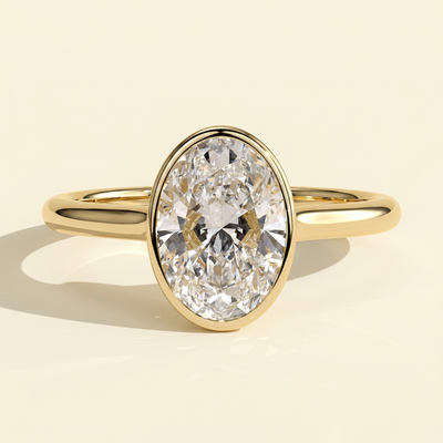 The Faina - Oval Cut Lab Grown Diamond Bezel Set Twisted Cathedral Engagement Ring