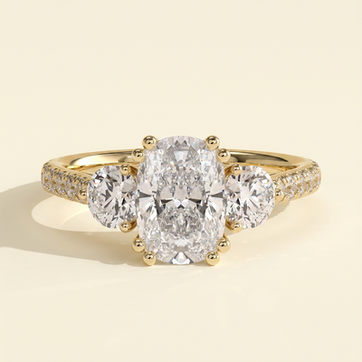 The Ivara - Elongated Cushion Cut Lab Grown Diamond Double Claw Three Stone with Pave Band and Cathedral Setting Engagement Ring