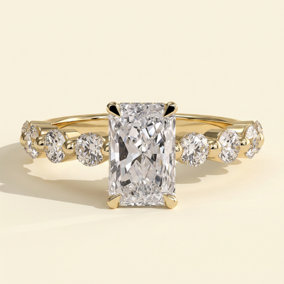 The Celia - Radiant Cut Lab Grown Diamond Four Claw Hidden Halo with Round Side Stones Engagement Ring