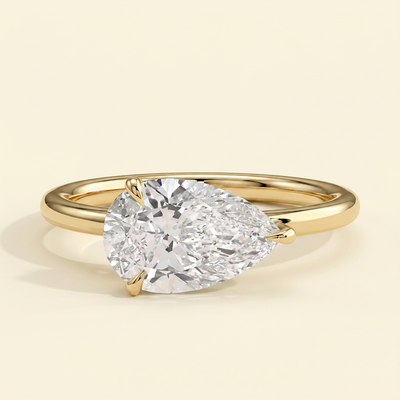 The Riona - Pear Cut Lab Grown Diamond East West Solitaire with Raised Basket Gallery Engagement Ring