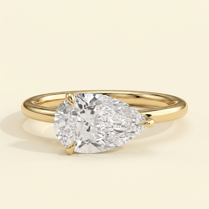The Riona - Pear Cut Lab Grown Diamond East West Solitaire with Raised Basket Gallery Engagement Ring