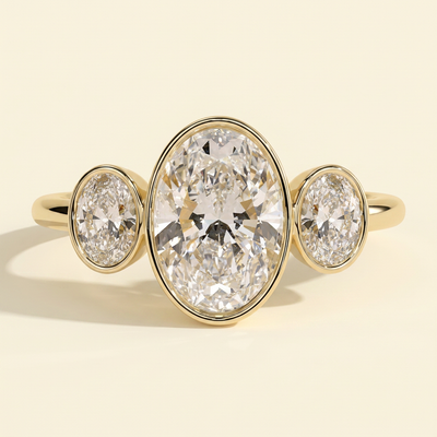 The Xiela - Oval Cut Lab Grown Diamond Three Stone Engagement Ring with Bezel Set Oval Side Stones