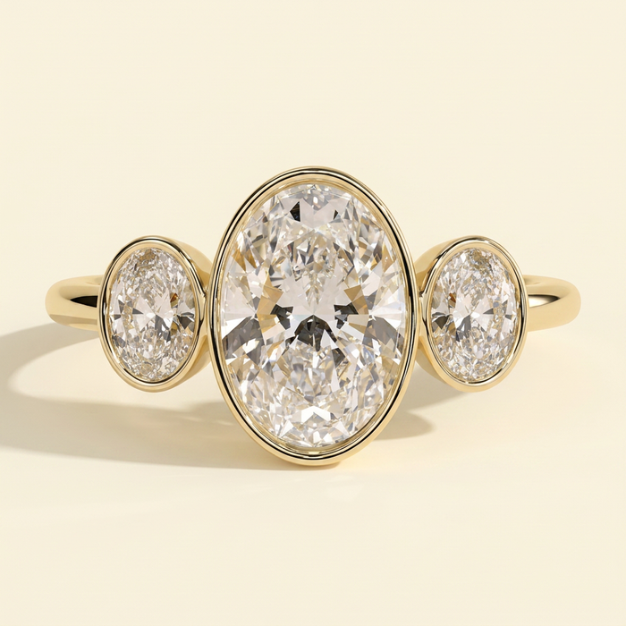 The Xiela - Oval Cut Lab Grown Diamond Three Stone Engagement Ring with Bezel Set Oval Side Stones