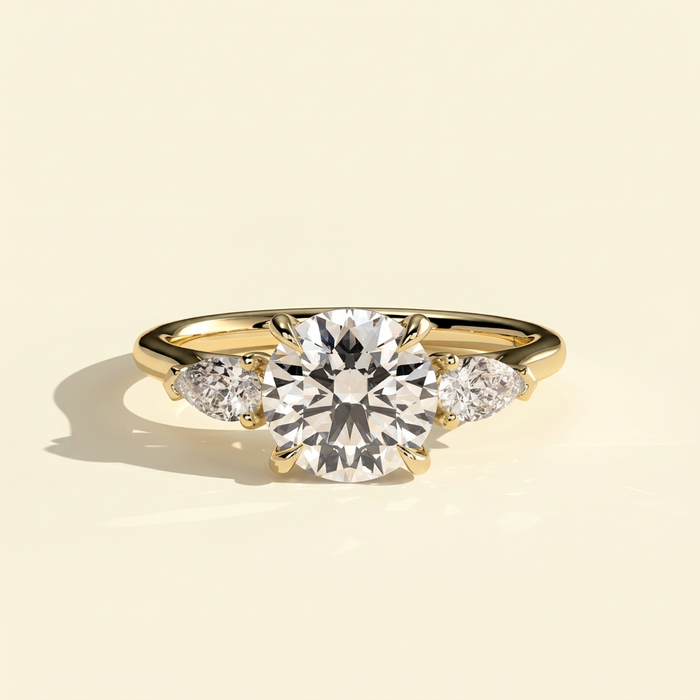 The Aurine - Round Cut Lab Grown Diamond Three Stone Ring with Pear Sides