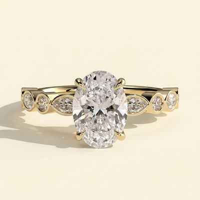 The Selina - Oval Cut Lab Grown Diamond Four Claw Solitaire with Bezel Set Round and Marquise Accent Stones Engagement Ring