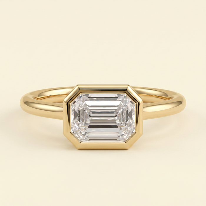 The Zaia - Emerald Cut Lab Grown Diamond East West Bezel Set Solitaire with Open Cathedral Setting Engagement Ring