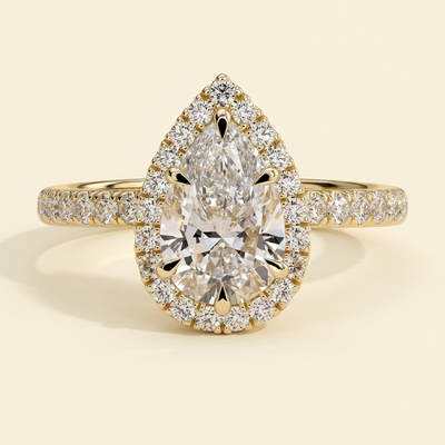 The Calla - Pear Cut Lab Grown Diamond Six Claw Halo Engagement Ring with Pave Band