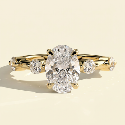 The Nuria - Oval Lab Grown Diamond Ring with Round Accents & Hidden Halo