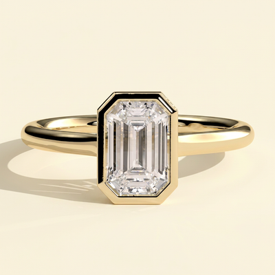 The Helia - Emerald Cut Lab Grown Diamond Bezel Set Solitaire with Open Cathedral Engagement Ring
