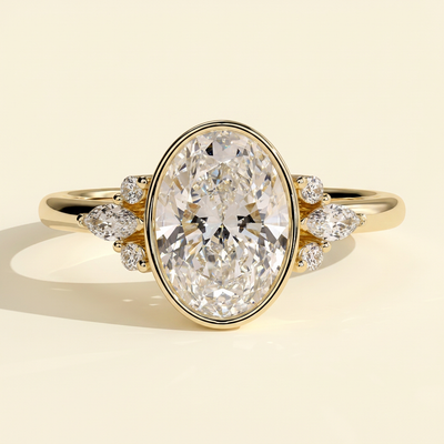 The Ziva - Oval Cut Lab Grown Diamond Bezel Set Solitaire with Marquise and Round Shoulder Stones Engagement Ring