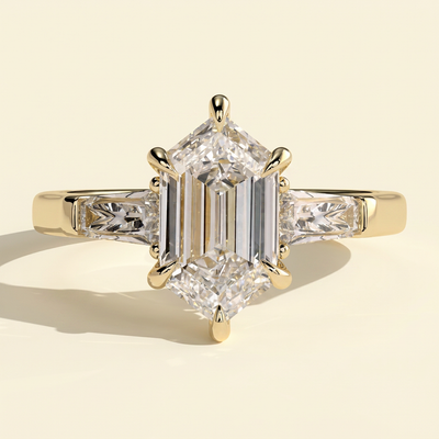 The Solara - Elongated Hexagon Cut Lab Grown Diamond Three Stone with Tapered Baguette Side Stones and Cathedral Setting Engagement Ring