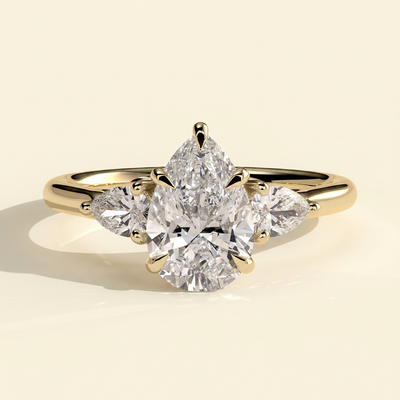The Viorela - Pear Cut Lab Grown Diamond Three Stone Engagement Ring with Pear Side Stones and Floating Cathedral Setting