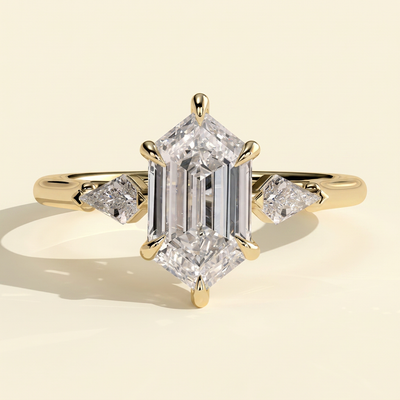 The Lavelle - Elongated Hexagon Cut Lab Grown Diamond Three Stone Engagement Ring with Kite Side Stones