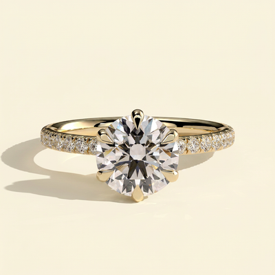 The Raela - Round Cut Lab Grown Diamond Six Claw Solitaire with Pave Collar and Pave Band