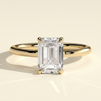 The Solera - Emerald Cut Lab Grown Diamond Low Set Solitaire with Hidden Halo and Open Bridge Engagement Ring