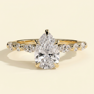 The Renelle - Pear Cut Lab Grown Diamond Five Claw Solitaire with Marquise and Round Accent Band