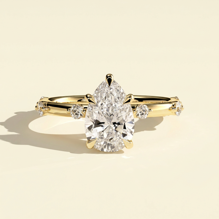 The Nixie - Pear Cut Lab Grown Diamond Ring with Hidden Halo and Accents