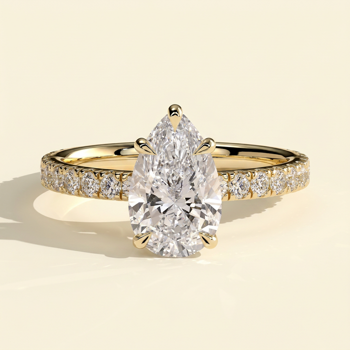The Estella - Pear Cut Lab Grown Diamond Solitaire with Pave Band Engagement Ring
