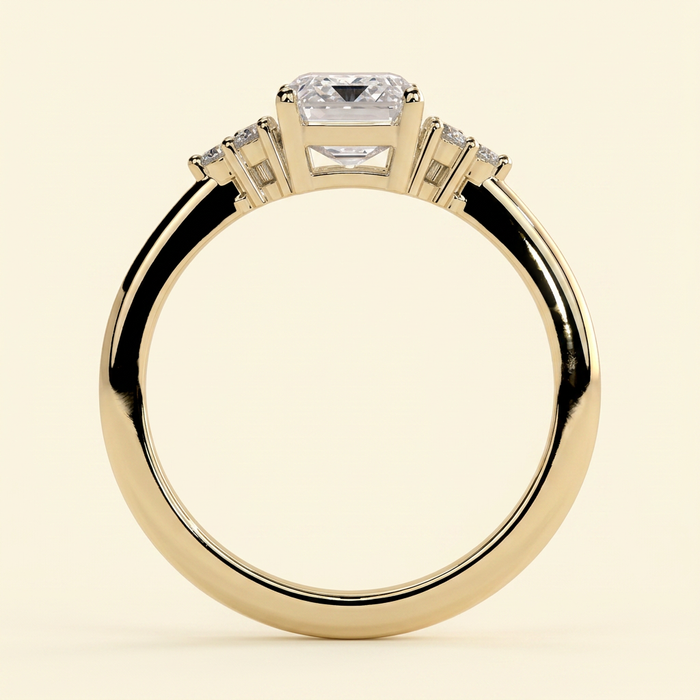 The Serene - Emerald Cut Lab Grown Diamond Low Set Solitaire with Round Shoulder Stones Engagement Ring