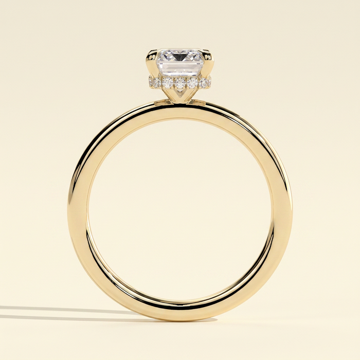 The Izara - Emerald Cut Lab Grown Diamond Four Claw Solitaire with Wrap Around Hidden Halo Engagement Ring
