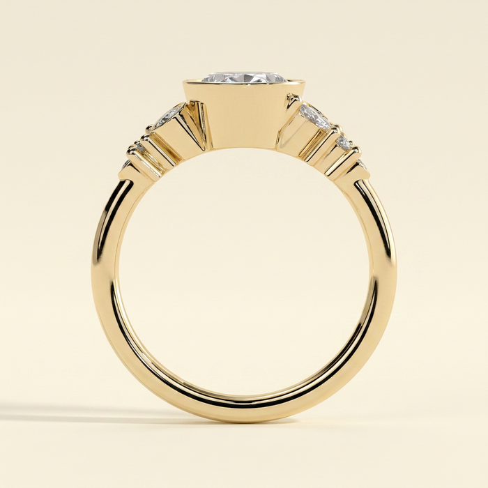 The Gemelle - Oval Cut Lab Grown Diamond Bezel Set Engagement Ring with Clustered Shoulder Accents