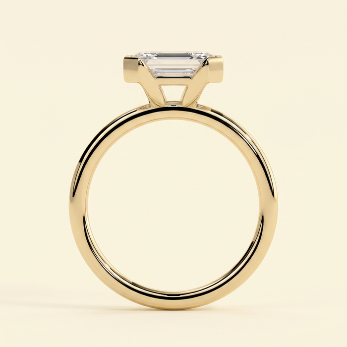 The Mara - Emerald Cut Lab Grown Diamond East West Half Bezel Solitaire Engagement Ring