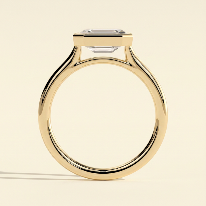 The Zaia - Emerald Cut Lab Grown Diamond East West Bezel Set Solitaire with Open Cathedral Setting Engagement Ring