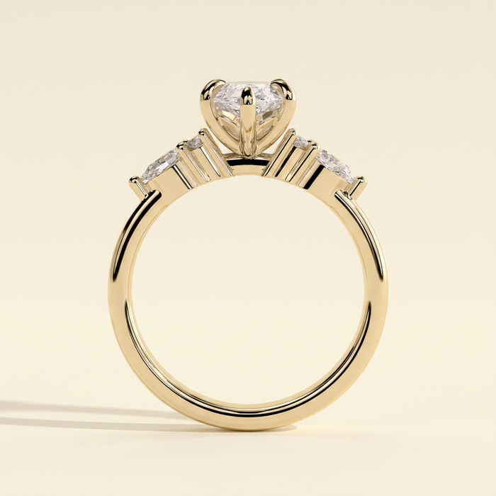 The Yara - Marquise Cut Lab Grown Diamond Six Claw Three Stone with Pear and Round Shoulder Stones Engagement Ring