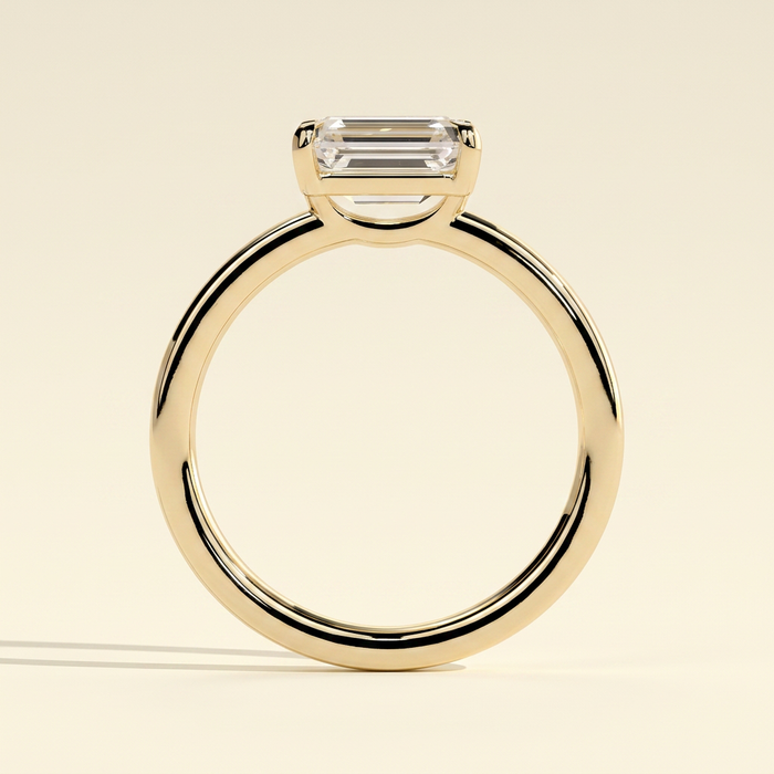 The Quila - Emerald Cut Lab Grown Diamond East West Solitaire Engagement Ring with Raised Basket