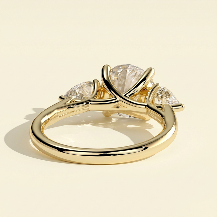 The Amara - Round Lab Grown Diamond Three Stone Ring with Pear Side Stones