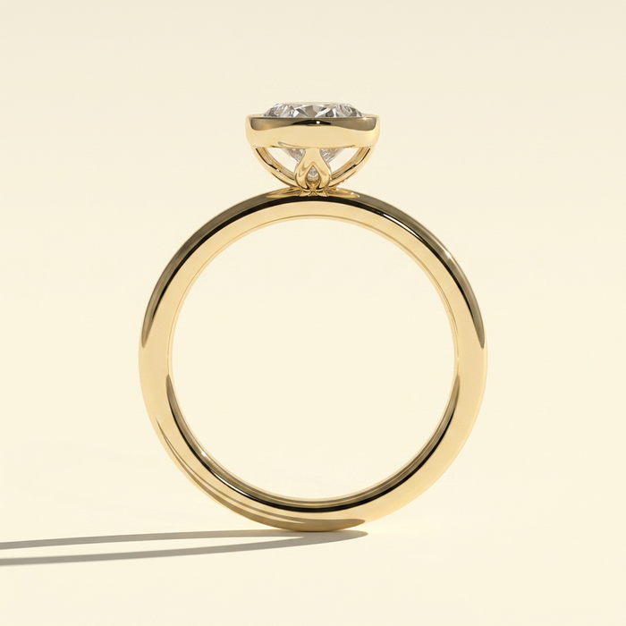 The Kelia - Oval Lab Grown Diamond Bezel Solitaire with Petal Gallery Setting