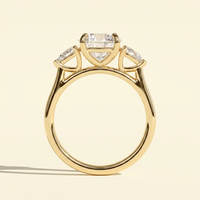 The Aurine - Round Cut Lab Grown Diamond Three Stone Ring with Pear Sides