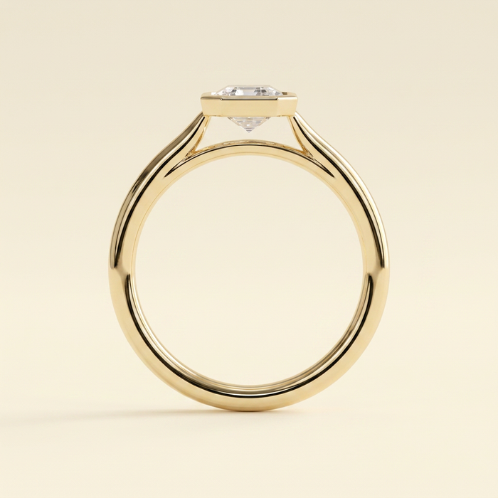 The Helia - Emerald Cut Lab Grown Diamond Bezel Set Solitaire with Open Cathedral Engagement Ring