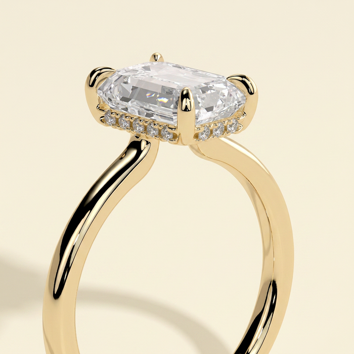The Solera - Emerald Cut Lab Grown Diamond Low Set Solitaire with Hidden Halo and Open Bridge Engagement Ring