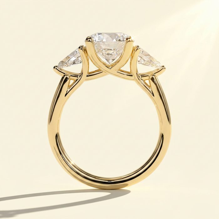 The Amara - Round Lab Grown Diamond Three Stone Ring with Pear Side Stones