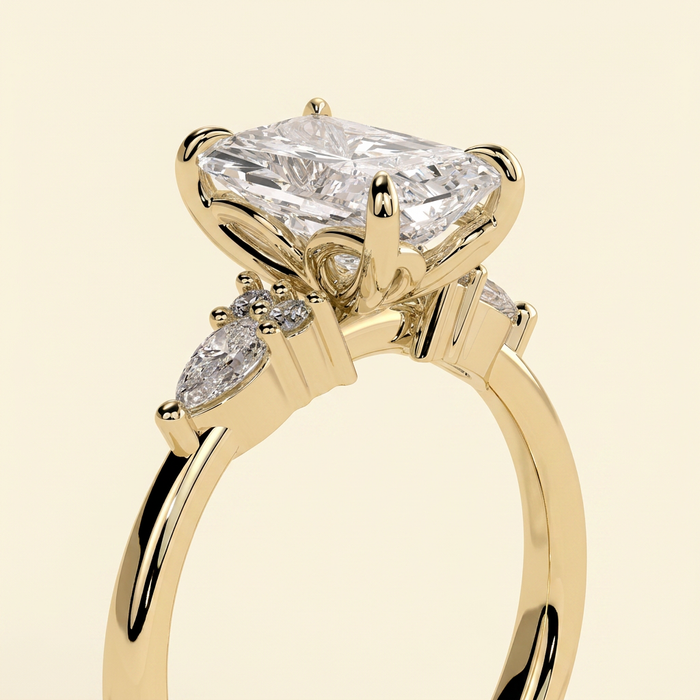 The Raina - Radiant Cut Lab Grown Diamond Three Stone Tulip Gallery Ring with Pear Side Stones